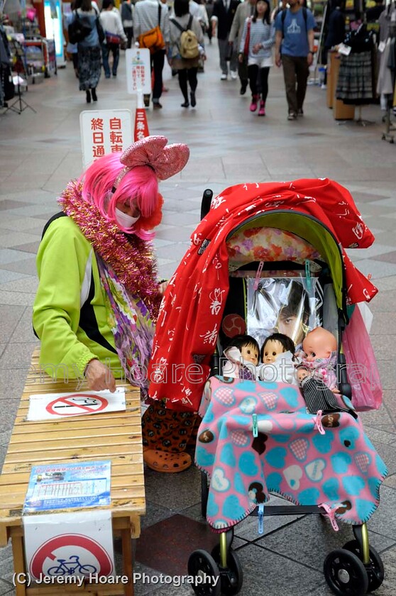 DSC7872-PROC FB2024 
 Old woman with dolls as children in a pram, Kyoto, Japan