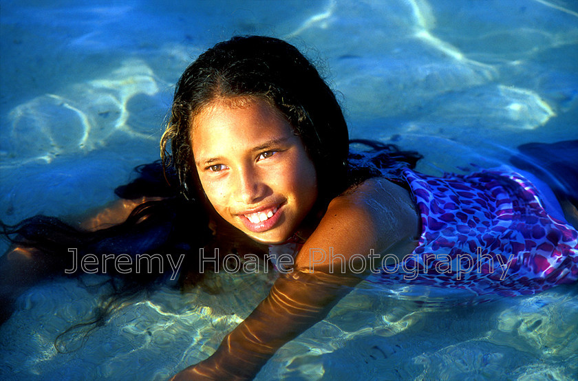 Cook-Islands-0008 
 Polynesian girl in Muri Lagoon,, Rarotonga, Cook Islands