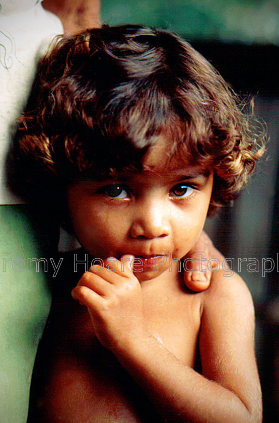 Travel-Amazon-child 
 Tearful child in the Amazon rainforest, Brazil