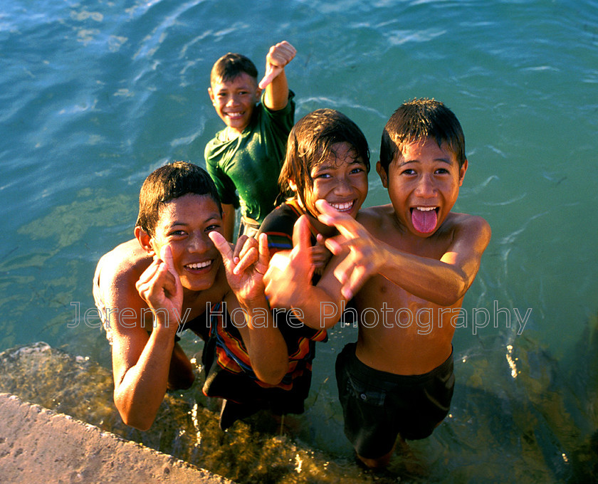 Tonga-0001 
 Excited boys in the water, Ha'apai, Tonga